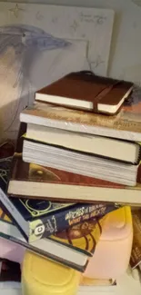 Stack of books creating a cozy and literary aesthetic on a shelf.