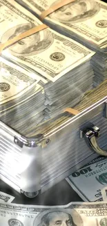 A stack of dollar bills in a metal briefcase, surrounded by scattered cash.