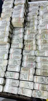 Stacks of currency bundled together on a surface.