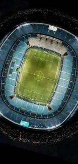 Aerial view of a brightly lit stadium at night.