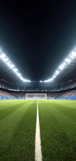 Night view of a football stadium under bright lights.