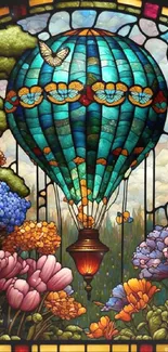 Stained glass hot air balloon with flowers and butterflies.