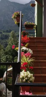 Mountain view with floral staircase and vibrant greenery.