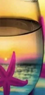 Starfish and sunset reflected in a glass, creating serene and colorful art.