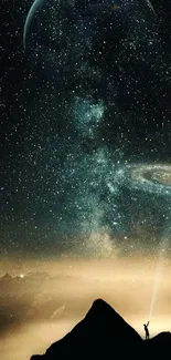 Person with flashlight on mountain under starry sky and galaxy swirl.