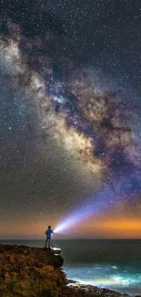 Man stargazing towards the Milky Way across a vast, captivating night sky.