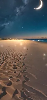 Serene night beach with crescent moon and stars.