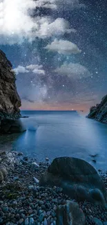 Starlit night over a rocky coastal scene, with a calming ocean view.