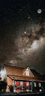 Farmhouse under a starry night sky with a bright full moon.