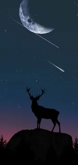 Silhouette of a deer in front of a night sky with moon and shooting stars.