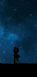 Silhouette of a couple under a starry night sky, surrounded by a cosmic atmosphere.