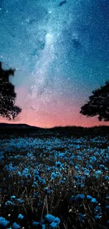 Starlit night sky with blue flowers and silhouetted trees under a galaxy.