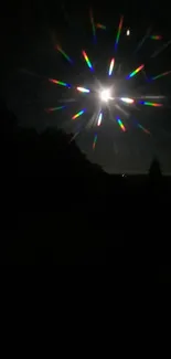 Starlit night with rainbow burst effect in dark sky.