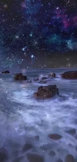 Starlit ocean night with rocks and a vivid starry sky.