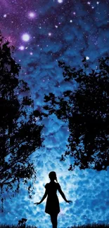 Silhouette of girl under a starry indigo night sky.