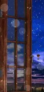 Starlit sky and hot air balloons seen through a wooden window with falling snow.