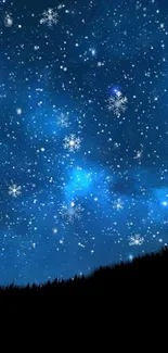 Starry night sky with falling snowflakes wallpaper.