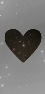 Heart-shaped starry design on gray background.