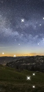 Starry night sky over mountains with a twilight glow.