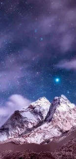 Snow-capped mountain under a starry purple night sky wallpaper.