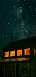 Cozy cabin at night under a starry sky.