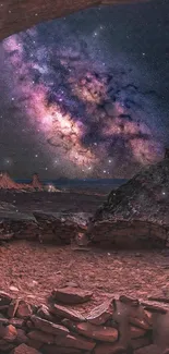 Starry night sky over the canyon with visible Milky Way and desert landscape.