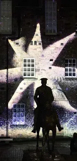 Silhouette of a horseman against a starry projection on a castle wall at night.