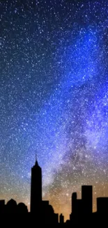 Silhouette cityscape under starry sky with Milky Way for mobile wallpaper.