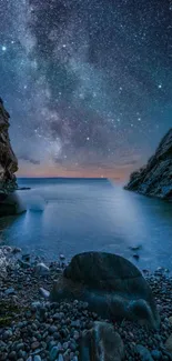 Starry night sky over a tranquil coastal scene with rocky cliffs and ocean waves.