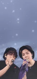 Starry night concert wallpaper featuring two performers under a vibrant sky.