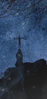 Silhouette of a cross against a starry night sky, creating a serene mobile wallpaper.