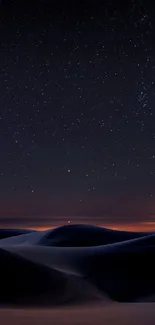 Serene desert under a starry night sky, ideal for mobile wallpaper.