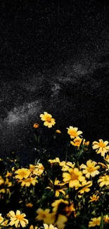 Starry night sky with vibrant yellow flowers in foreground.