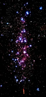 Starry galaxy wallpaper with pink and blue stars on a black background.