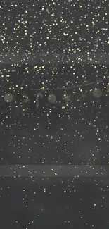 Dark gray wallpaper with gold glitter specks.