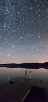 Starry night sky reflecting on a tranquil lake with wooden dock.