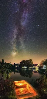 Starry night over a peaceful lake with a glowing boat under the Milky Way.