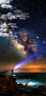 Lone figure under a stunning Milky Way night sky wallpaper featuring bright stars.