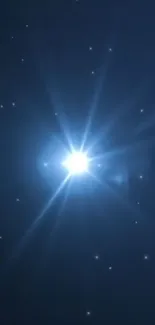 A bright star illuminates a dark blue night sky, with scattered smaller stars.