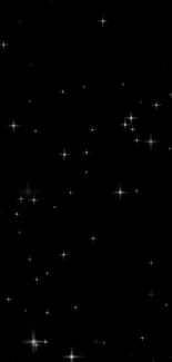 Starry night wallpaper showing twinkling stars on a black background.