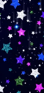 Colorful glittering stars on a dark blue starry night wallpaper.