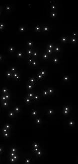 Dark wallpaper with glowing white dots representing stars.