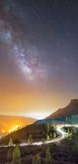 Starry night over a winding mountain road with glowing lights.