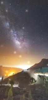 Starry night sky with glowing horizon over mountain landscape.