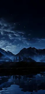 Nighttime mountain scene with stars reflecting on a lake.