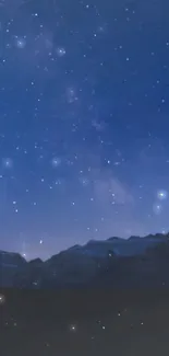 Starry night sky over mountains wallpaper.