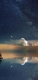 Sailing boat under a starry sky reflecting on the calm ocean water.