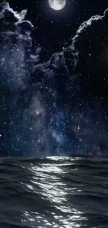 Starry night sky above a calm ocean with moonlight reflecting on water.