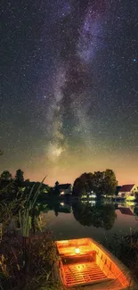 Serene lake under a starry night sky with glowing reflection.