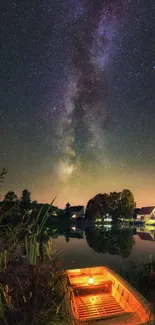 Starry night sky over a calm lake with a lantern-lit boat.